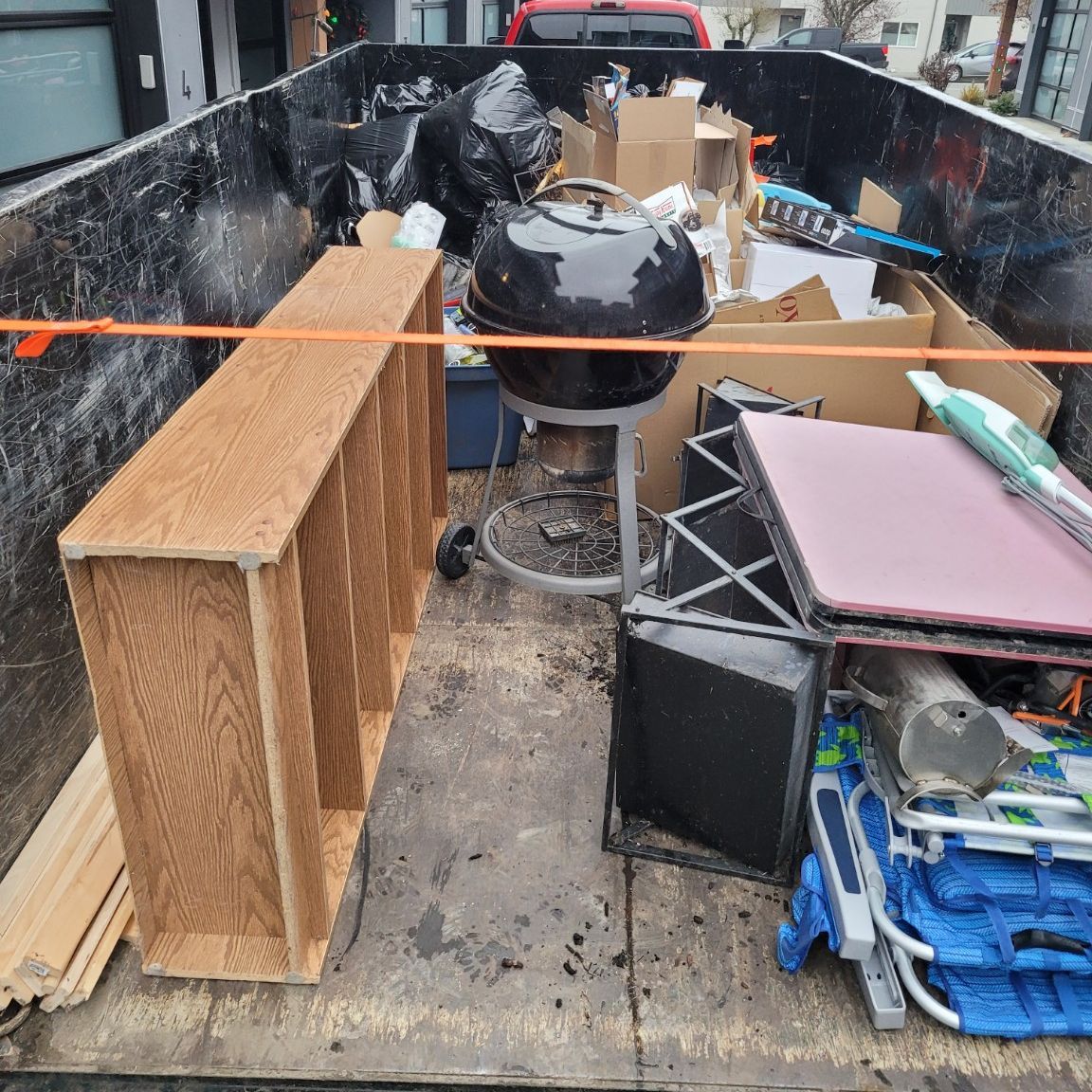 A real quarter load: a shelf unit, barbecue and boxes in the Junk Matters trailer