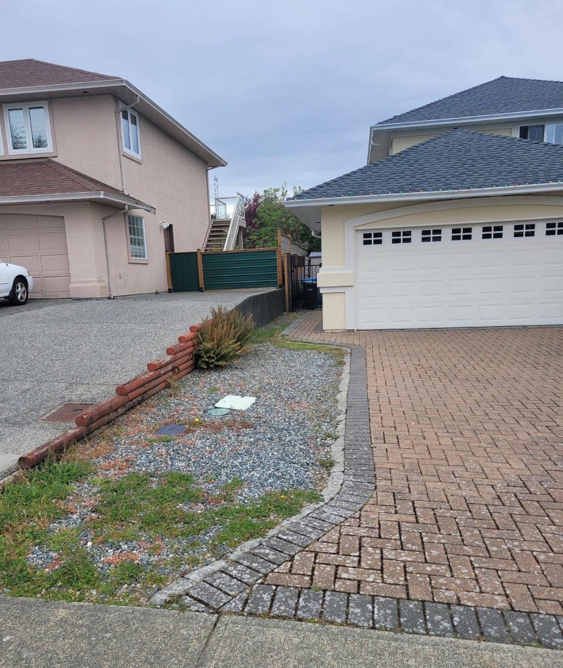 The same Nanaimo driveway completely clear and swept after Junk Matters hauled the pile away