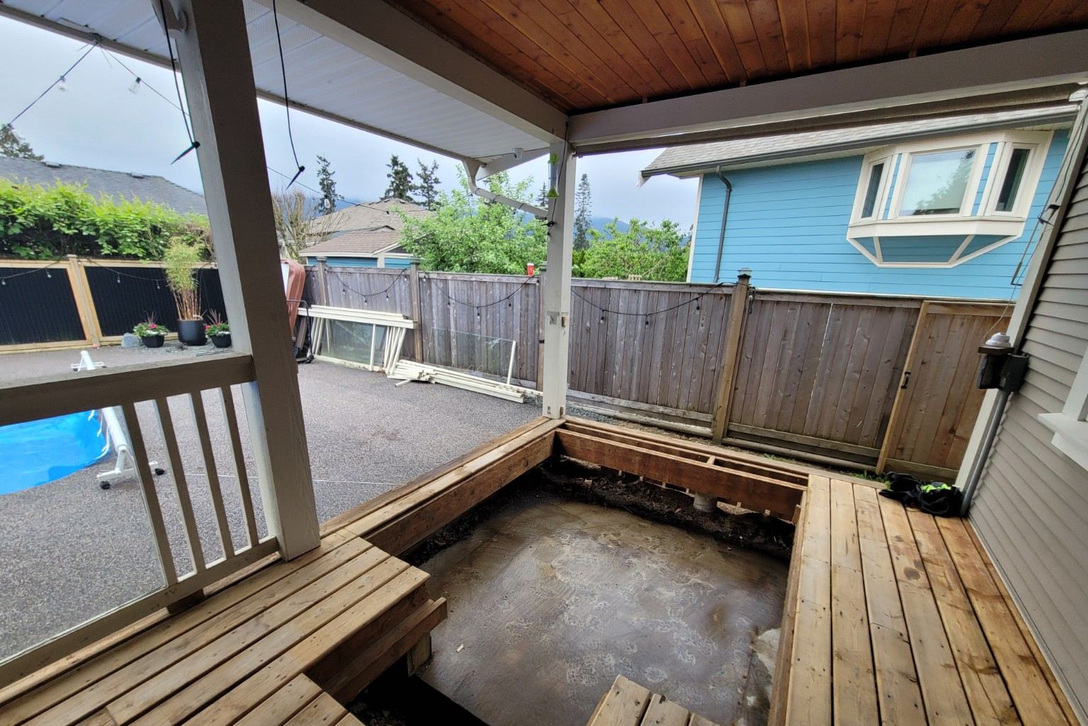 The empty deck opening after the hot tub was removed