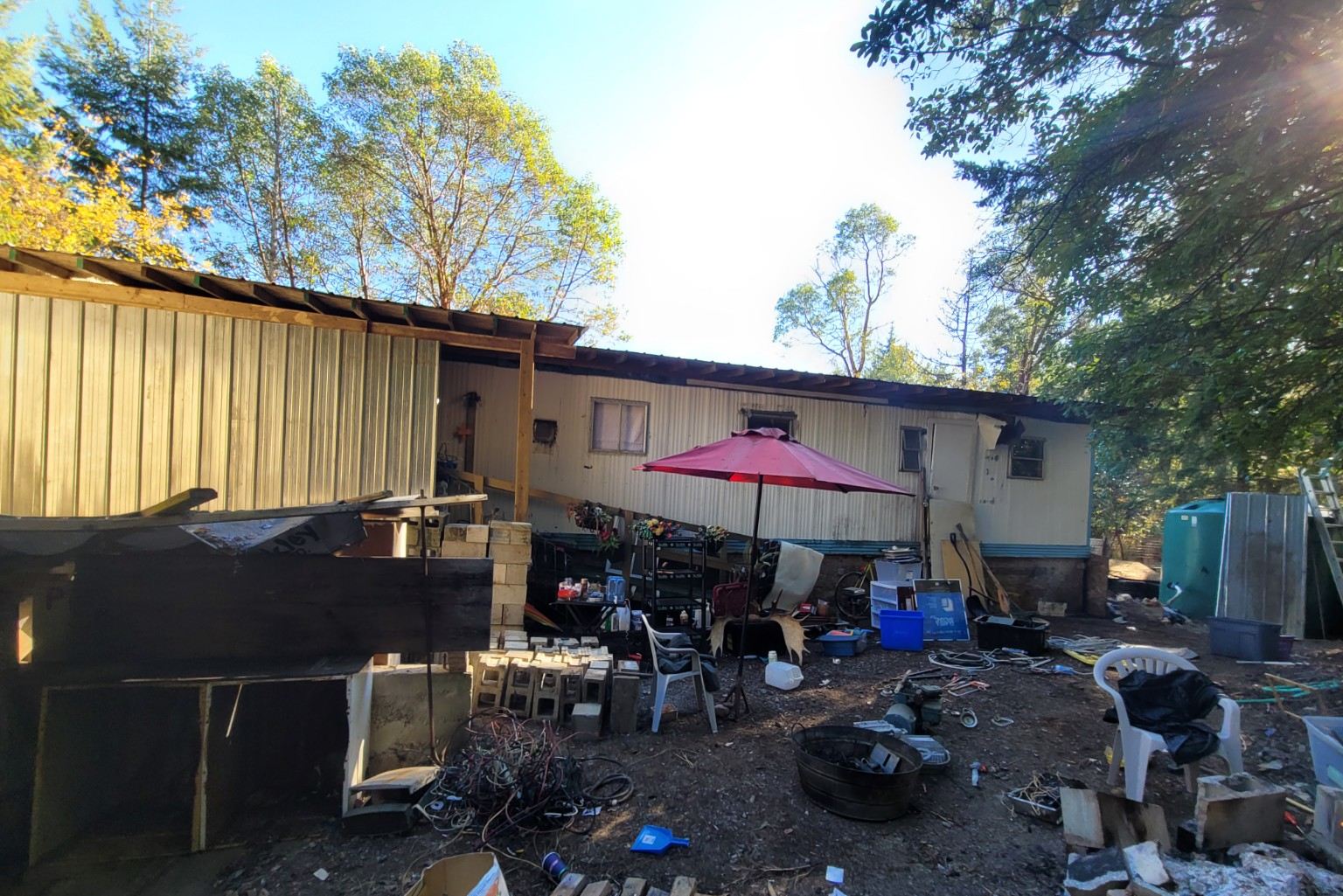 Property in Ruckledge strewn with junk and debris before demolition cleanup