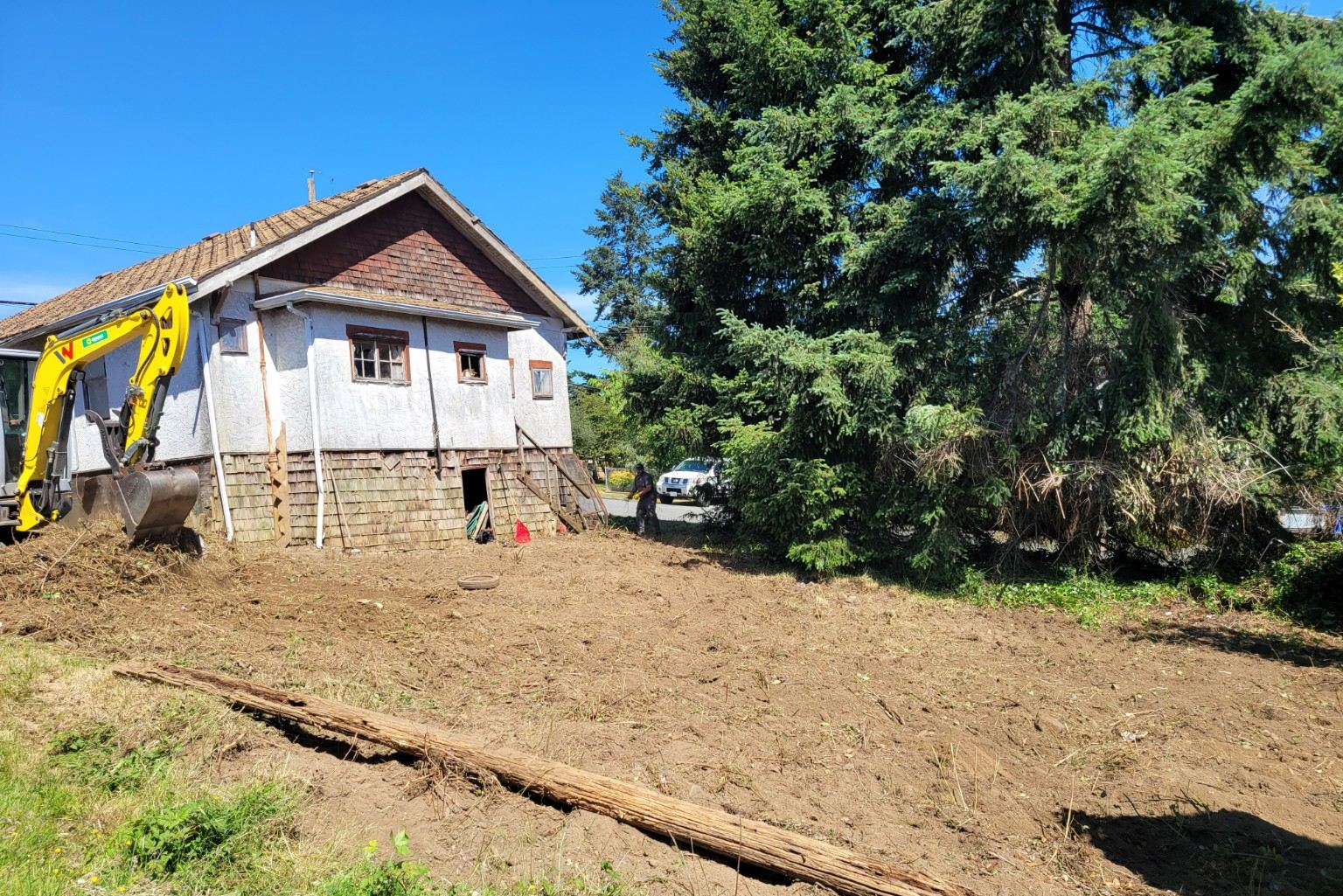 The same house side cleared to open ground