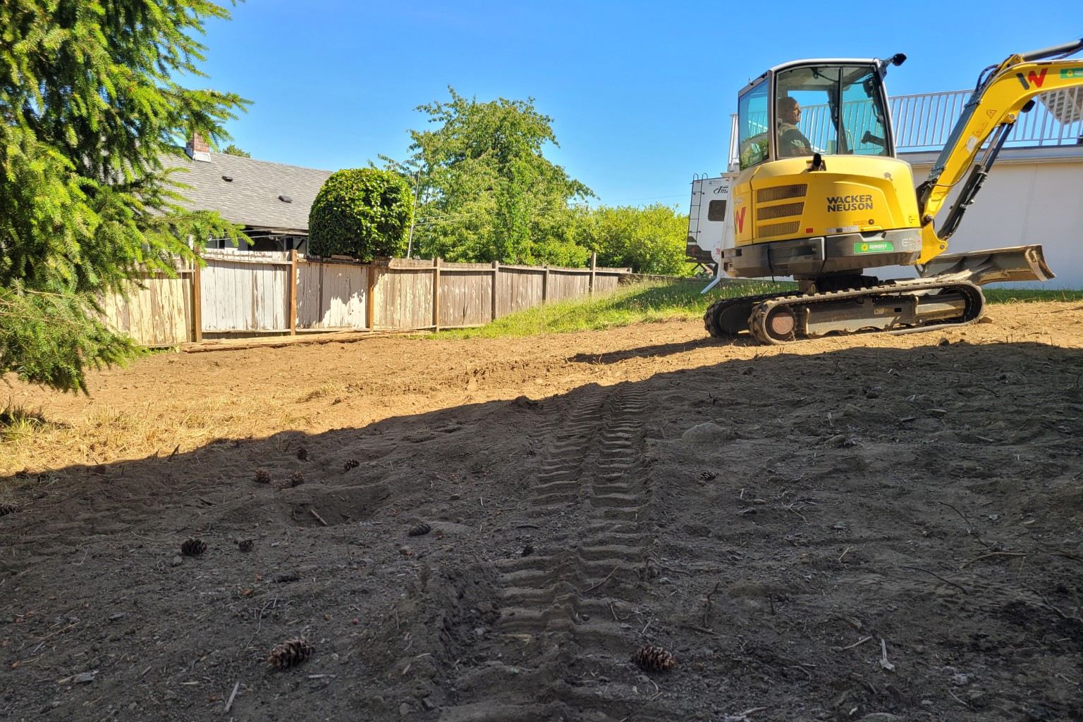 The same lot cleared to graded bare dirt